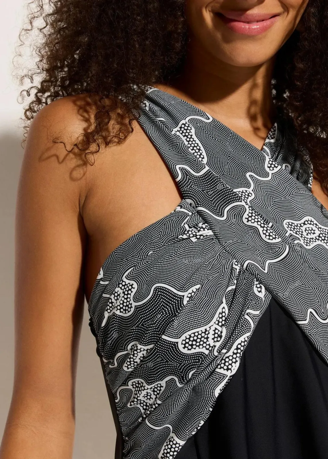 bonprix Nachhaltigere Materialien|Badekleider^Badekleid mit Wickel-Optik schwarz bedruckt