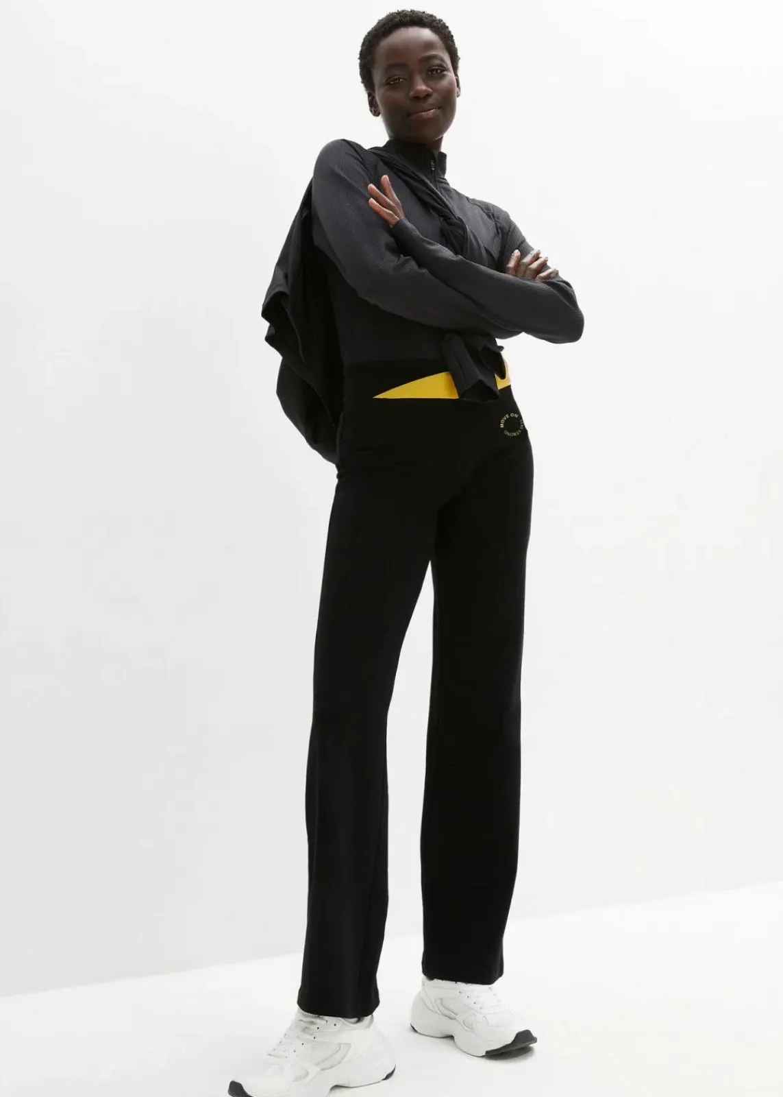 bonprix Hosen|Sportbekleidung^Baumwoll Sporthose mit Stretch, Bootcut schwarz/zitronengelb