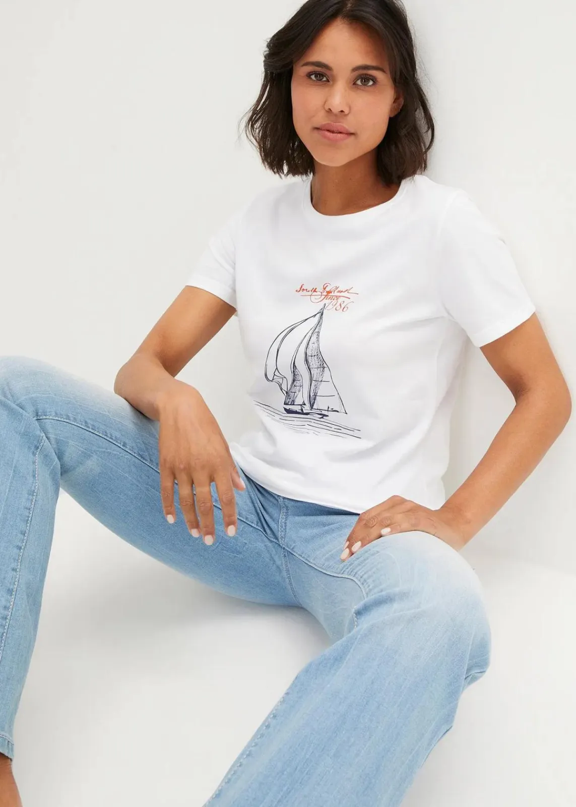 bonprix Shirts & Tops|Nachhaltigere Materialien^Baumwoll T-Shirt mit Seitenschlitz und Druck weiß bedruckt