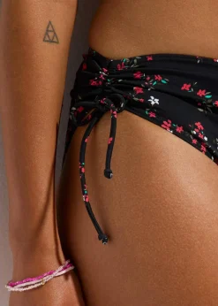 bonprix Nachhaltigere Materialien|Mix & Match^Bikinihose (2er Pack) mit seitlicher Schnürung schwarz + schwarz floral