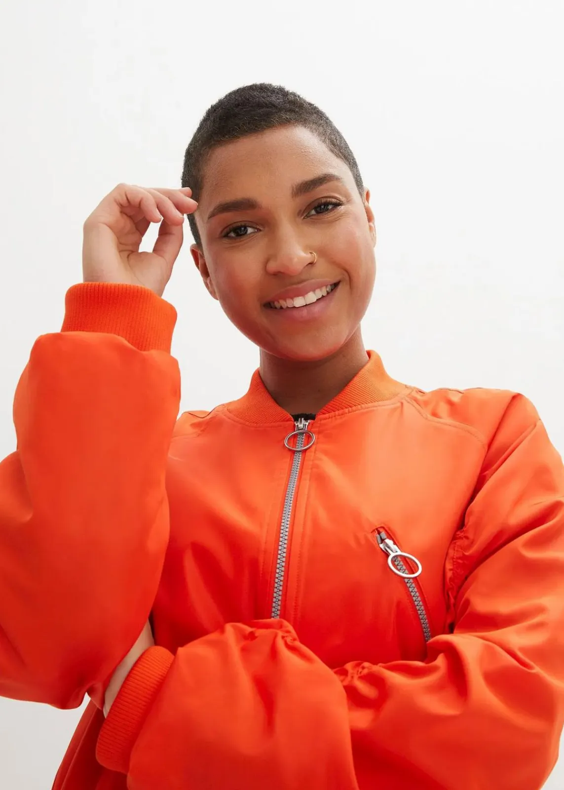 bonprix Nachhaltigere Materialien|Jacken & Mäntel^Blouson-Mantel mit Strickkragen tieforange