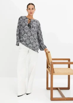 bonprix Blusen & Tuniken|Nachhaltigere Materialien^Blusenshirt aus strukturierter Viskose schwarz/weiß bedruckt