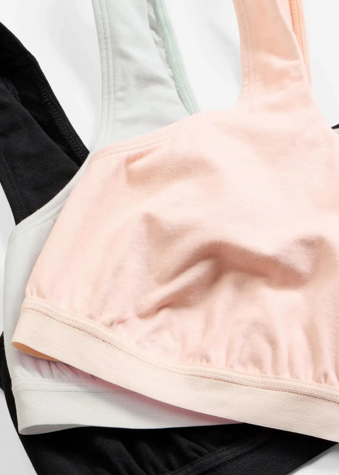 bonprix Wäsche·Baumwollunterwäsche|Nachhaltigere Materialien^Bustier mit Bio-Baumwolle (3er Pack) cremeblau+schwarz+seidenrosa