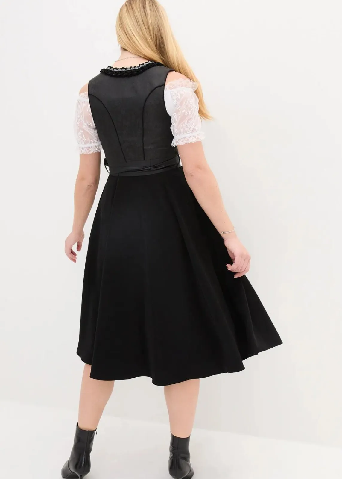 bonprix Kleider|Bekleidung·Pullover & Strickjacken^Dirndl mit Pailletten Schürze (2-tlg.Set) schwarz gemustert