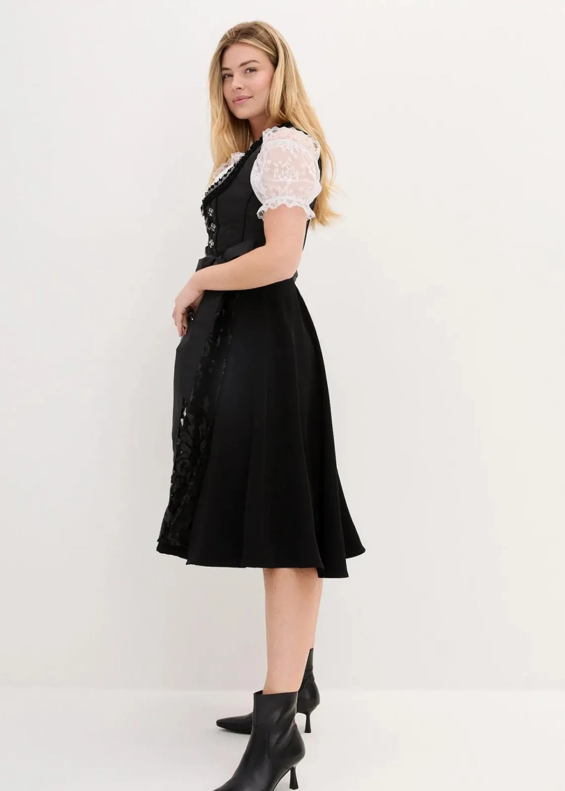 bonprix Kleider|Bekleidung·Pullover & Strickjacken^Dirndl mit Pailletten Schürze (2-tlg.Set) schwarz gemustert