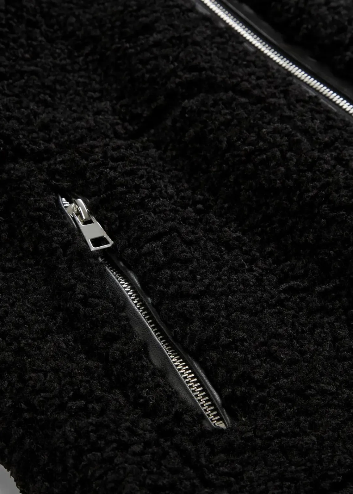 bonprix Jacken & Mäntel|Nachhaltigere Materialien^Fellimitat-Jacke aus Teddyfleece schwarz
