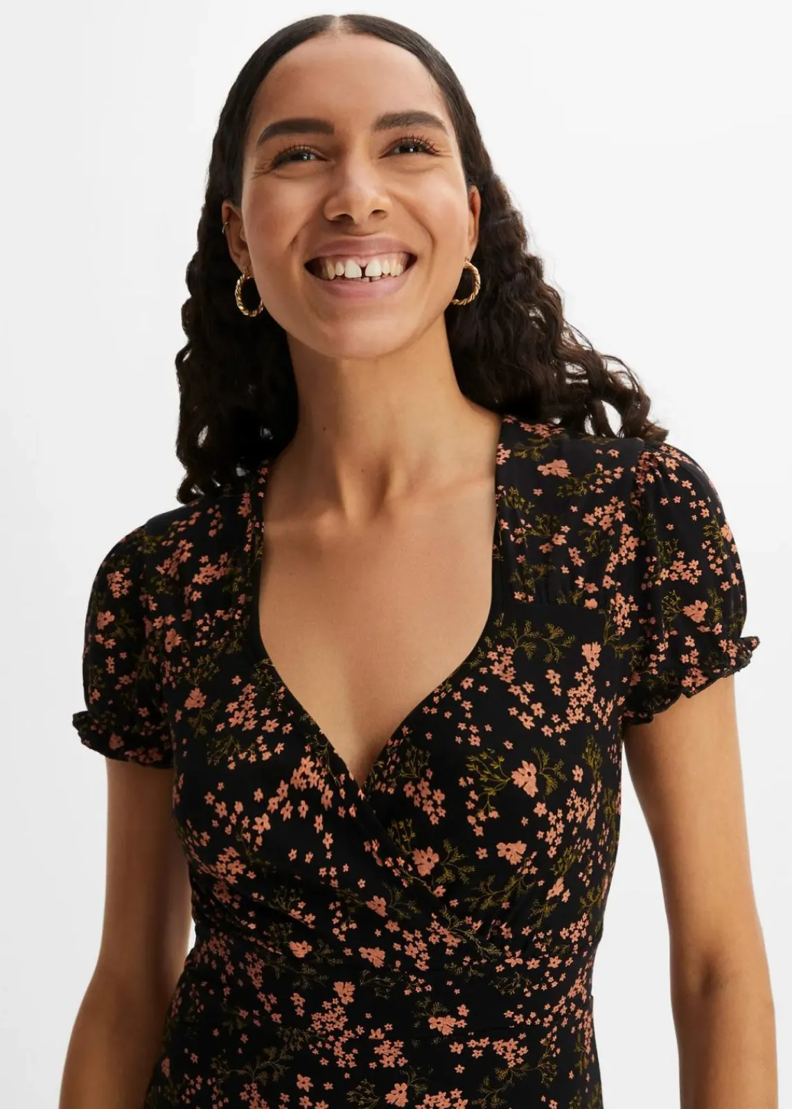 bonprix Nachhaltigere Materialien|Kleider^Jerseykleid aus Viskose-Mix schwarz floral