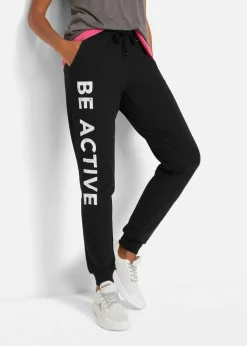 bonprix Bekleidung·Sweat|Bekleidung·Blusen & Tuniken^Jogginghose aus Baumwolle mit Druck, Loose Fit schwarz/weiß bedruckt