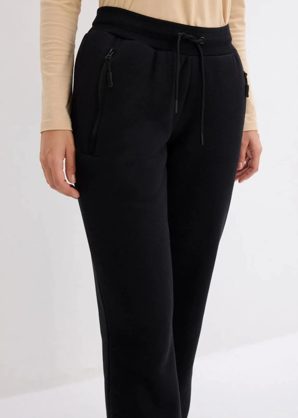 bonprix Bekleidung·Blusen & Tuniken|Bekleidung·Kleider^Jogginghose mit Teddyfleece-Futter, weit geschnitten schwarz