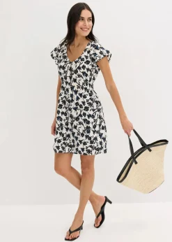 bonprix Kleider^Kleid mit Flügelärmeln aus strukturiertem Material wollweiß/schwarz bedruckt