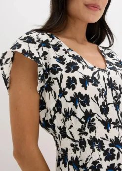 bonprix Kleider^Kleid mit Flügelärmeln aus strukturiertem Material wollweiß/schwarz bedruckt