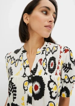 bonprix Bekleidung·Jacken & Mäntel|Blusen & Tuniken^Kurzarmbluse mit Smockdetail aus strukturierter Viskose wollweiß bedruckt
