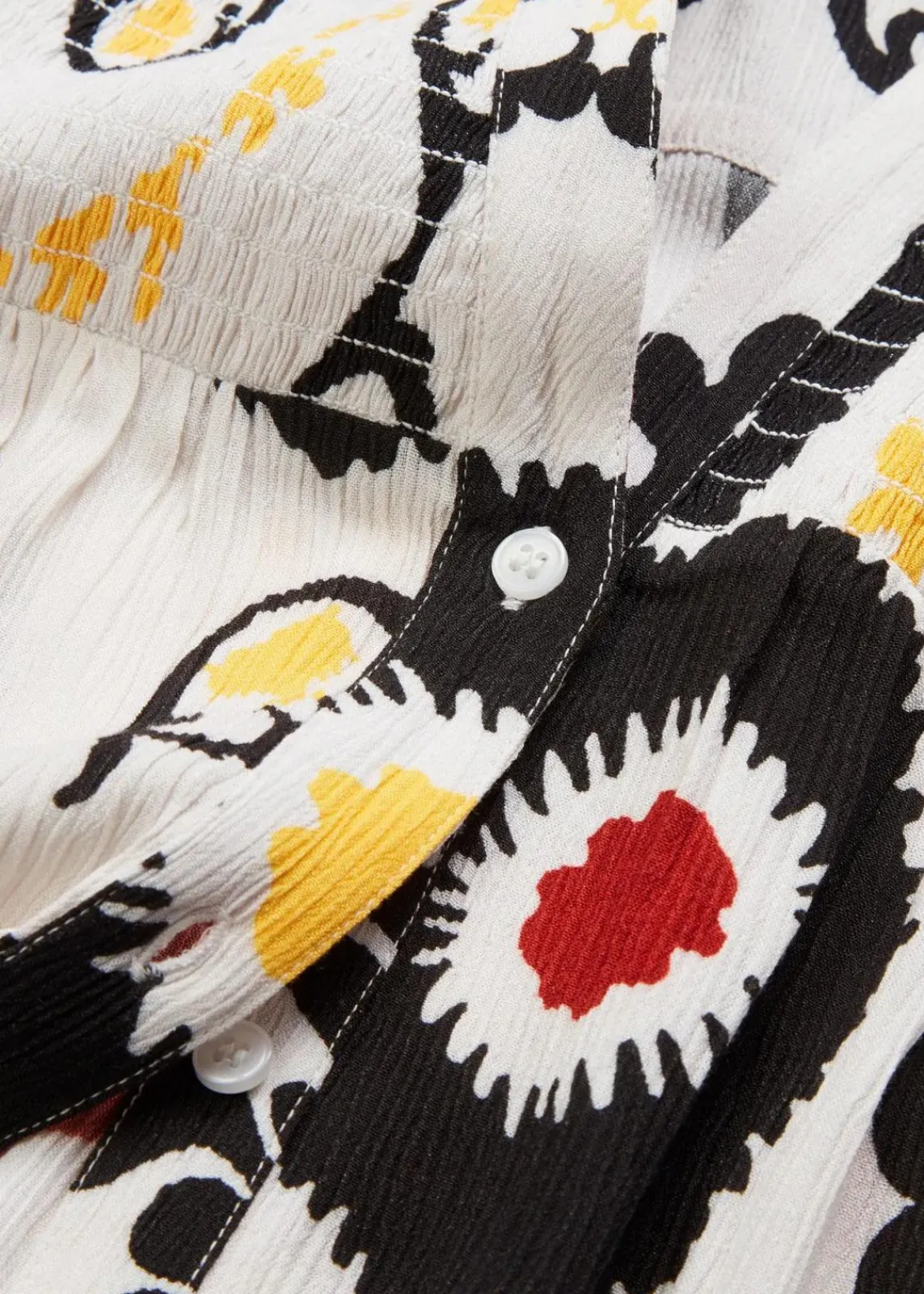 bonprix Bekleidung·Jacken & Mäntel|Blusen & Tuniken^Kurzarmbluse mit Smockdetail aus strukturierter Viskose wollweiß bedruckt