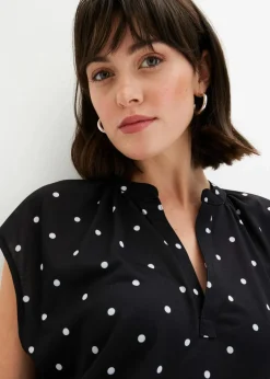 bonprix Nachhaltigere Materialien|Shirts & Tops^Kurzarmshirt mit Henley-Ausschnitt aus Viskosemix schwarz/weiß gepunktet