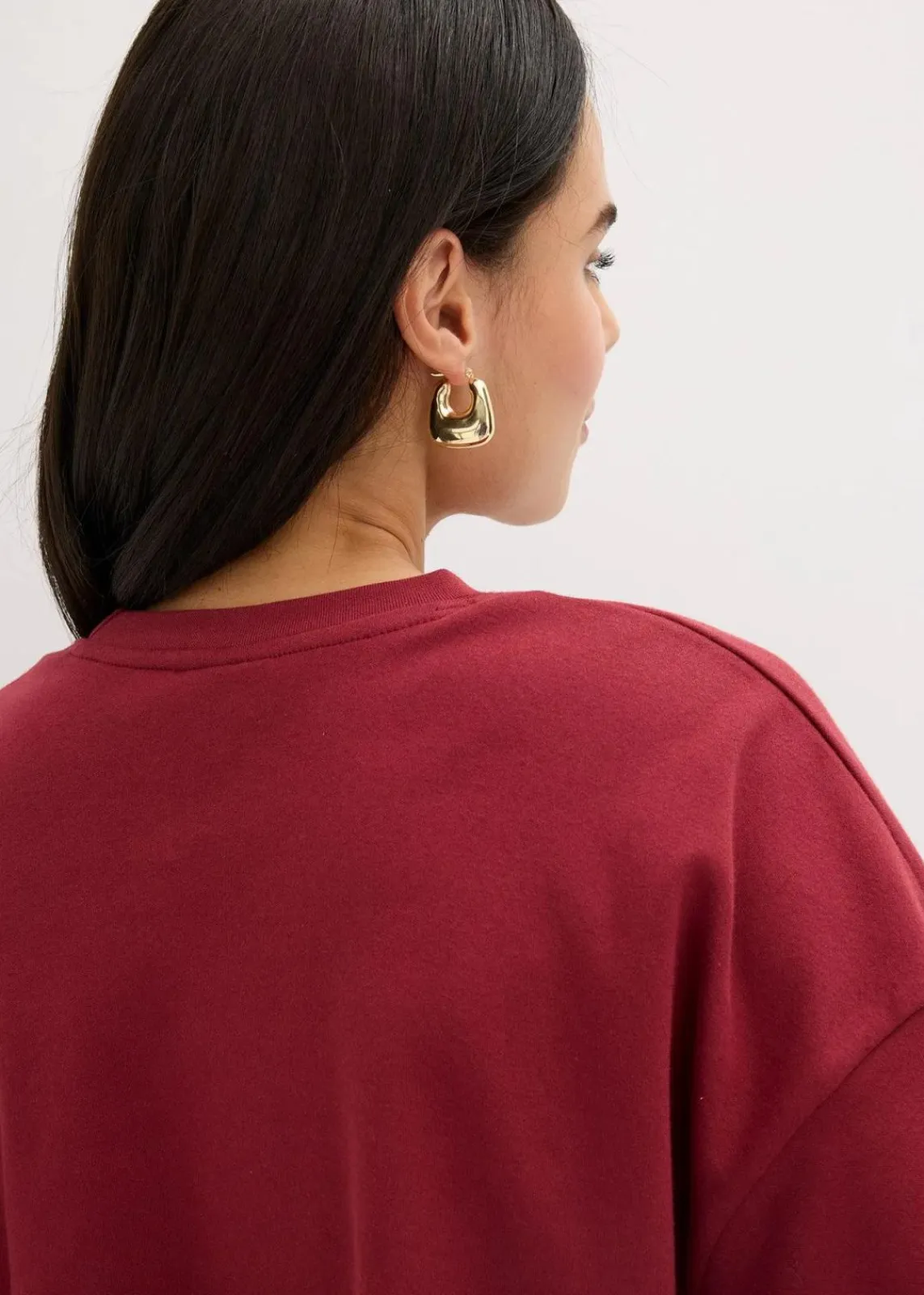 bonprix Shirts & Tops|Nachhaltigere Materialien^Kurzes T-Shirt aus reiner Bio-Baumwolle pflaumenrot leo bedruckt