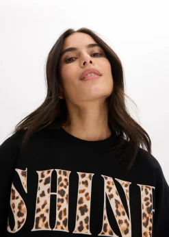 bonprix Nachhaltigere Materialien|Shirts & Tops^Kurzes T-Shirt aus reiner Bio-Baumwolle schwarz leo bedruckt