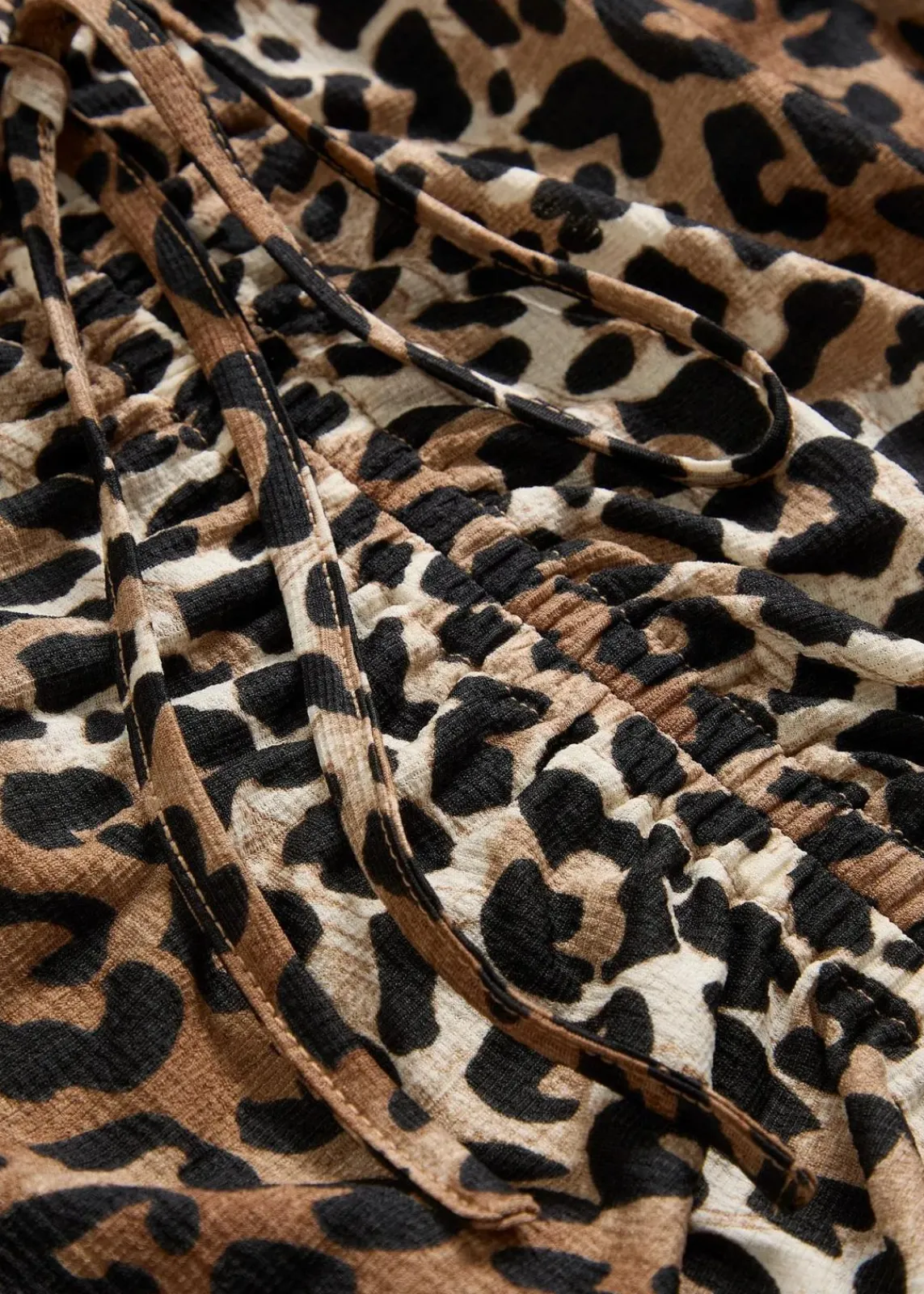 bonprix Shirts & Tops^Langarmshirt mit Raff-Details natur/schwarz/braun/dunkelcognac/camel leo bedruckt