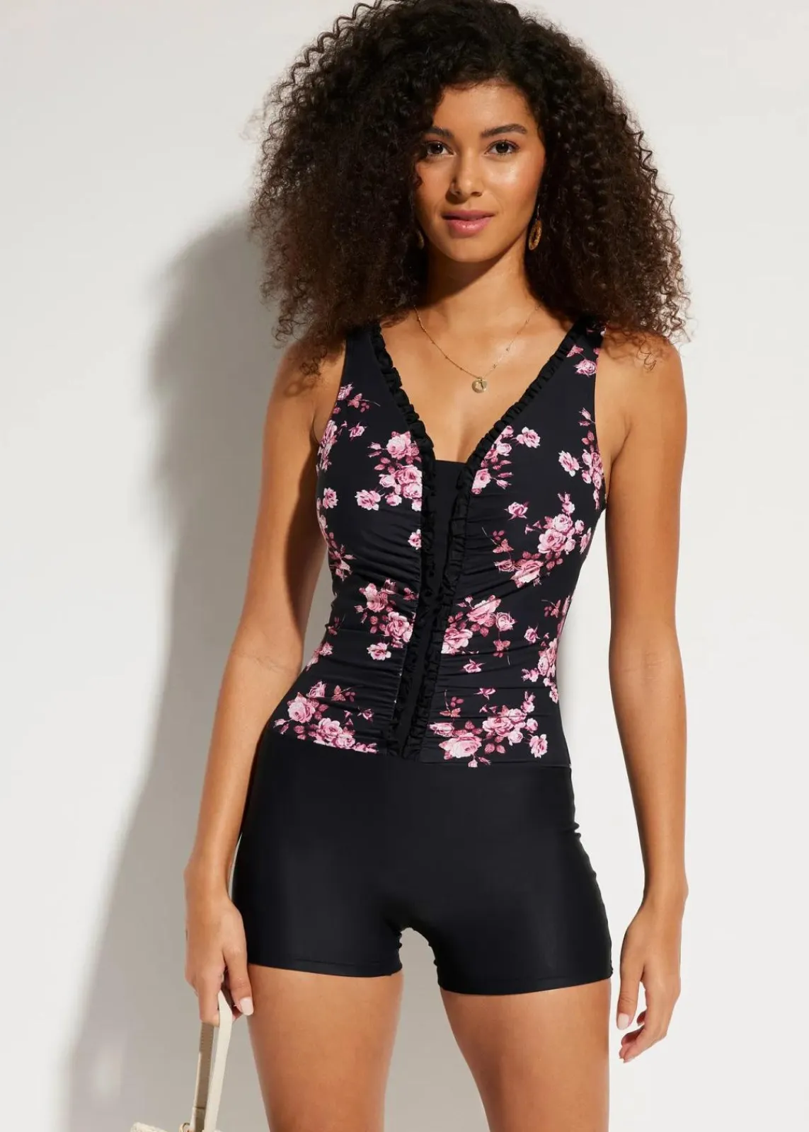bonprix Nachhaltigere Materialien|Shapewear^Light Shape-Badeanzug mit Bein schwarz floral