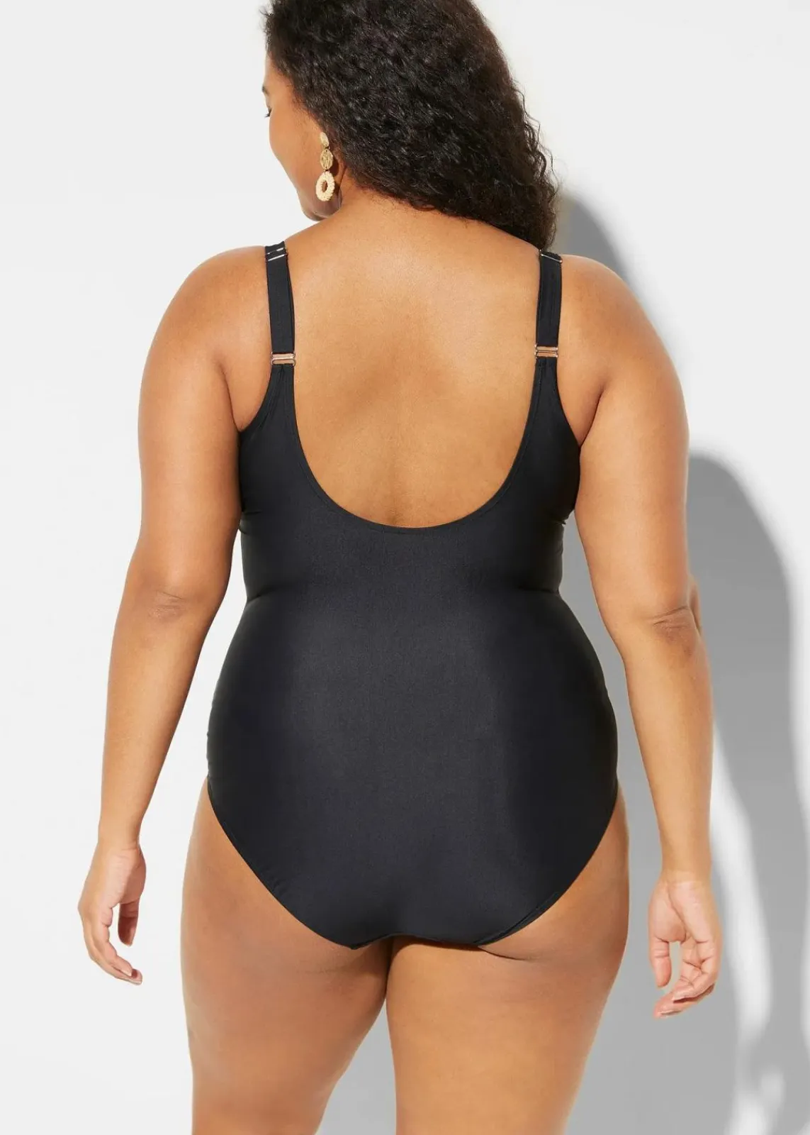bonprix Nachhaltigere Materialien|Shapewear^Light Shape-Badeanzug mit V-Ausschnitt schwarz bedruckt