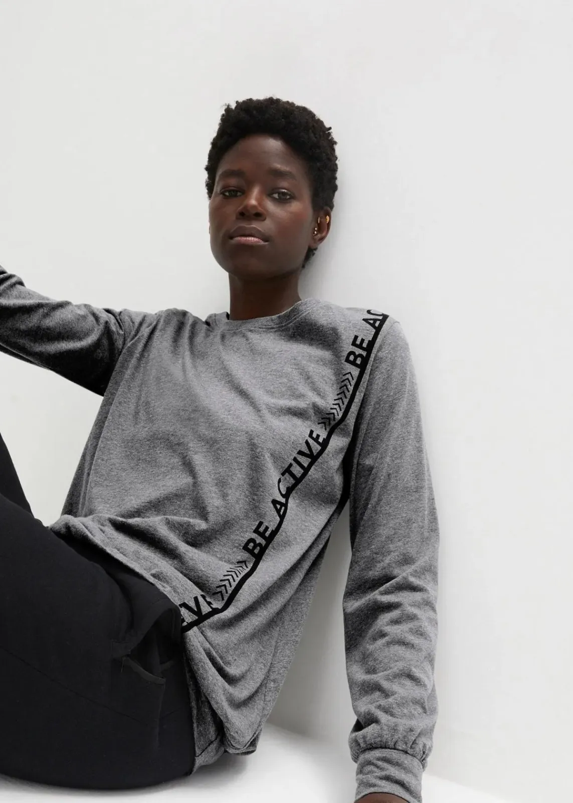 bonprix Shirts & Tops|Nachhaltigere Materialien^Lockeres Sport-Shirt grau meliert bedruckt