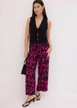 bonprix Hosen|Kurzgrößen^Marlenehose aus fließender Viskose schwarz/pink bedruckt