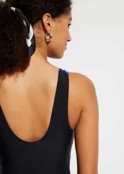 bonprix Nachhaltigere Materialien|Shapewear^Medium Shape-Badeanzug schwarz graphisch