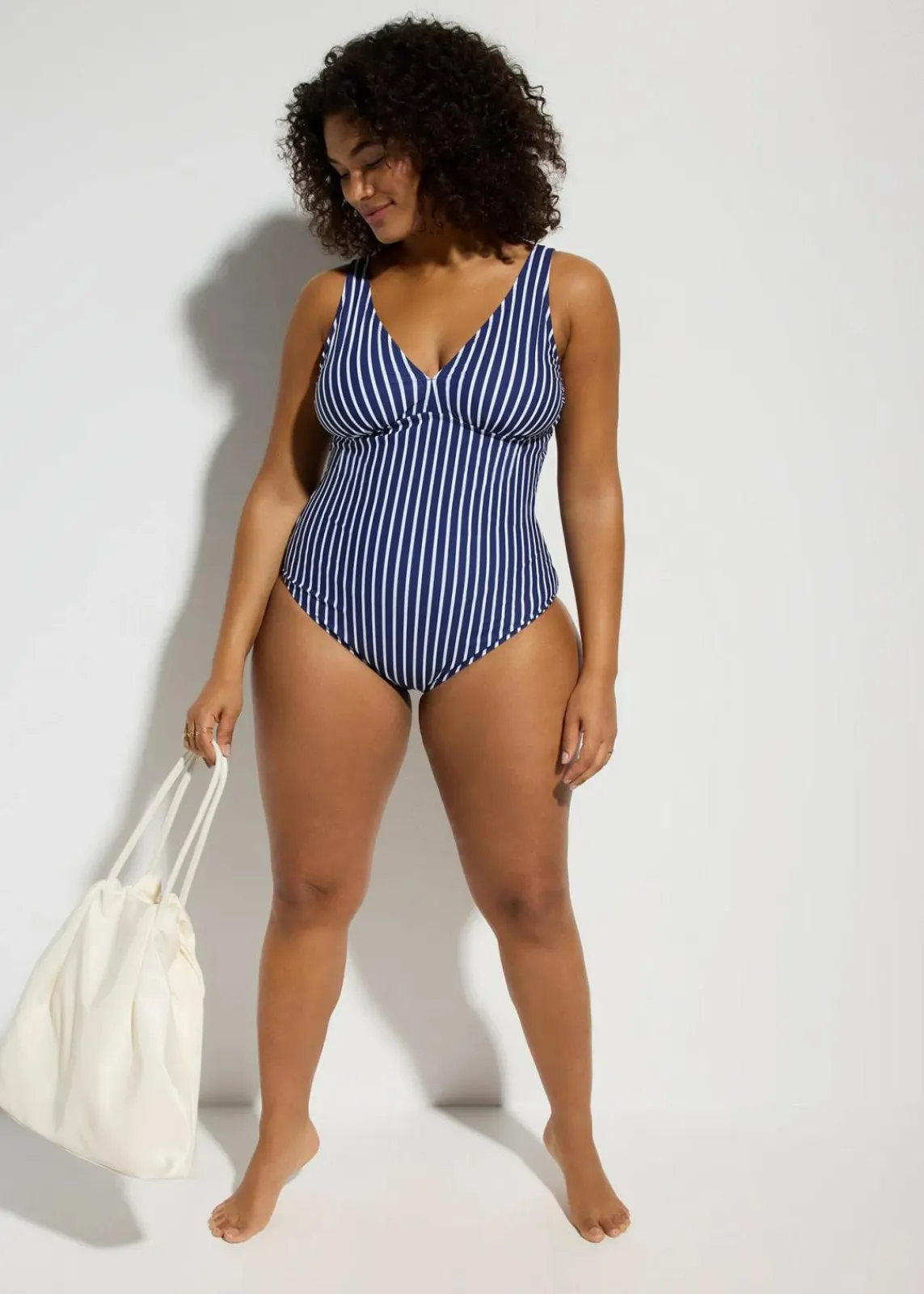 bonprix Bademode·Badeanzüge|Bademode·Shapewear^Medium Shape-Badeanzug mit tiefem Ausschnitt mitternachtsblau/weiß gestreift