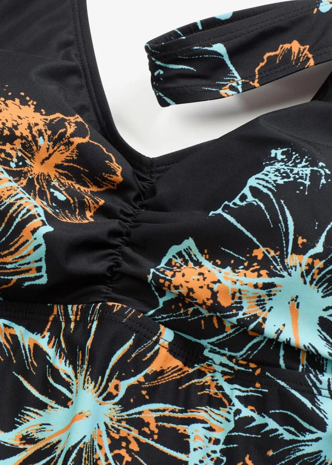 bonprix Nachhaltigere Materialien|Bademode·Badekleider^Medium Shape-Badekleid mit V-Ausschnitt schwarz/orange/türkis bedruckt