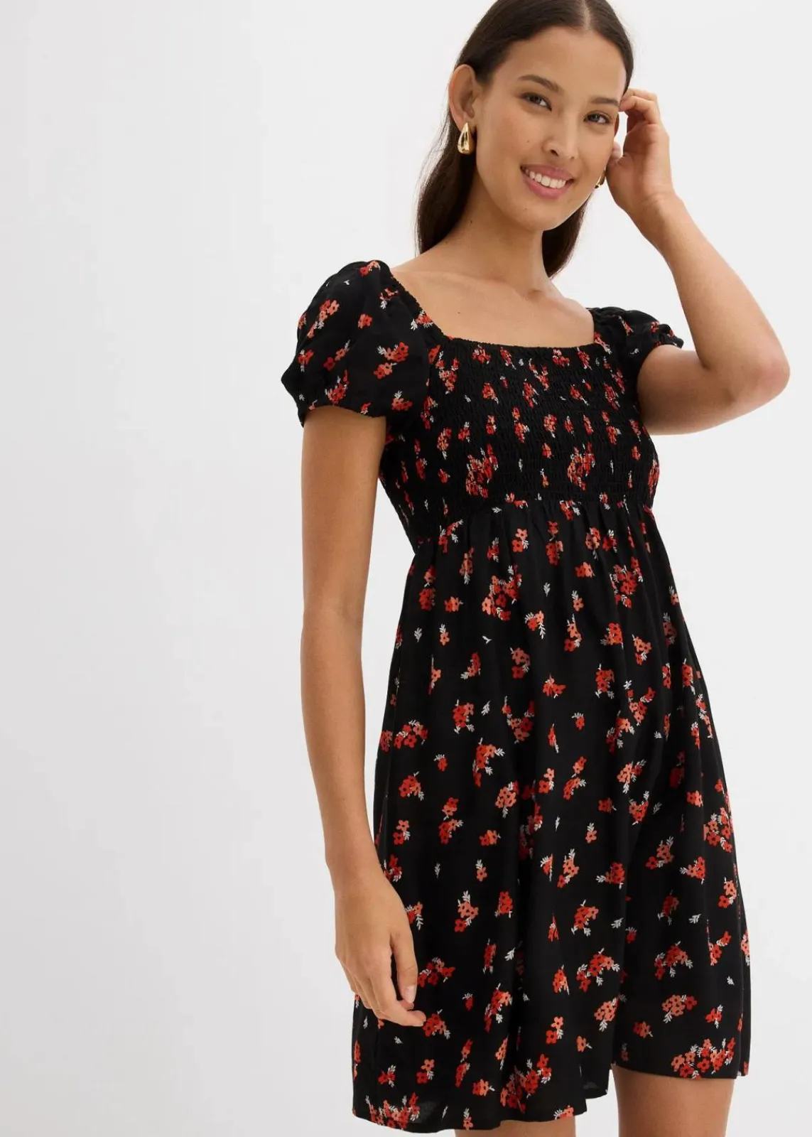bonprix Nachhaltigere Materialien|Kleider^Minikleid aus fließender Viskose schwarz/weiß/tieforange bedruckt
