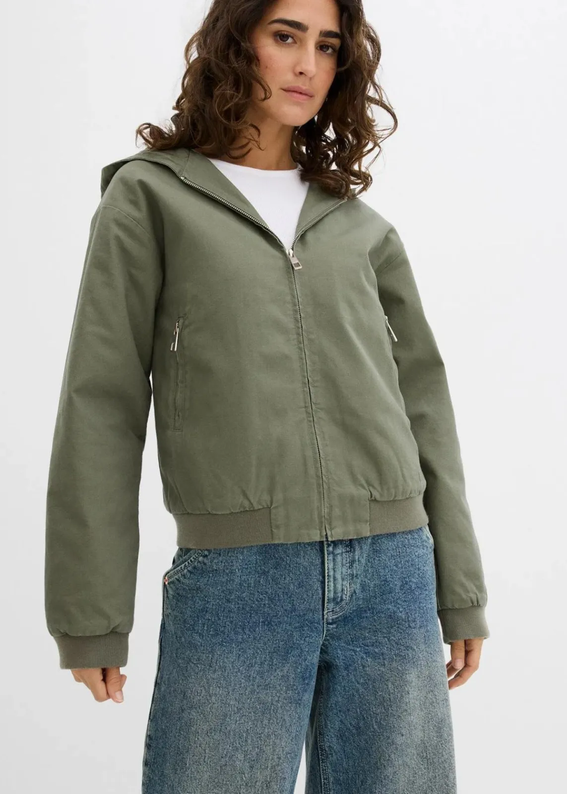 bonprix Jacken & Mäntel^Outdoorjacke aus reiner Baumwolle schlammgrün