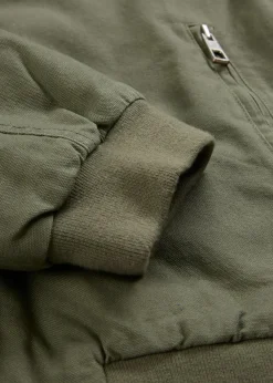 bonprix Jacken & Mäntel^Outdoorjacke aus reiner Baumwolle schlammgrün