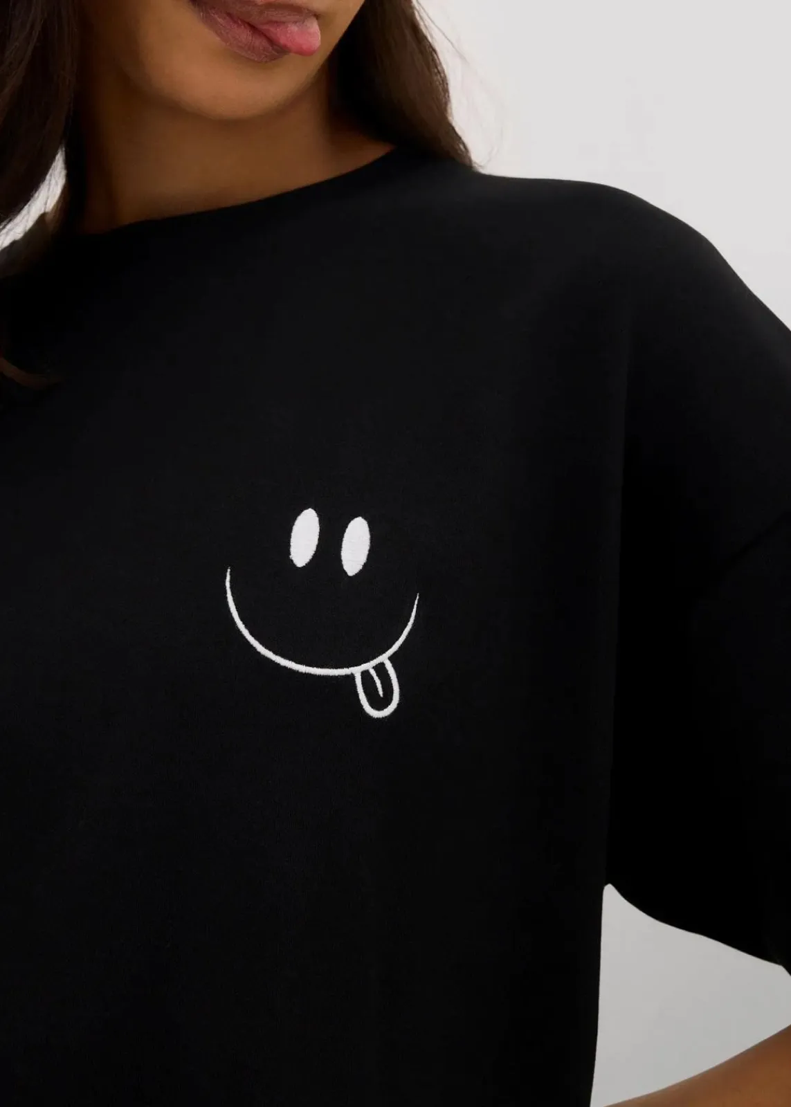 bonprix Shirts & Tops|Nachhaltigere Materialien^Oversize-Longshirt aus reiner Bio-Baumwolle schwarz bedruckt