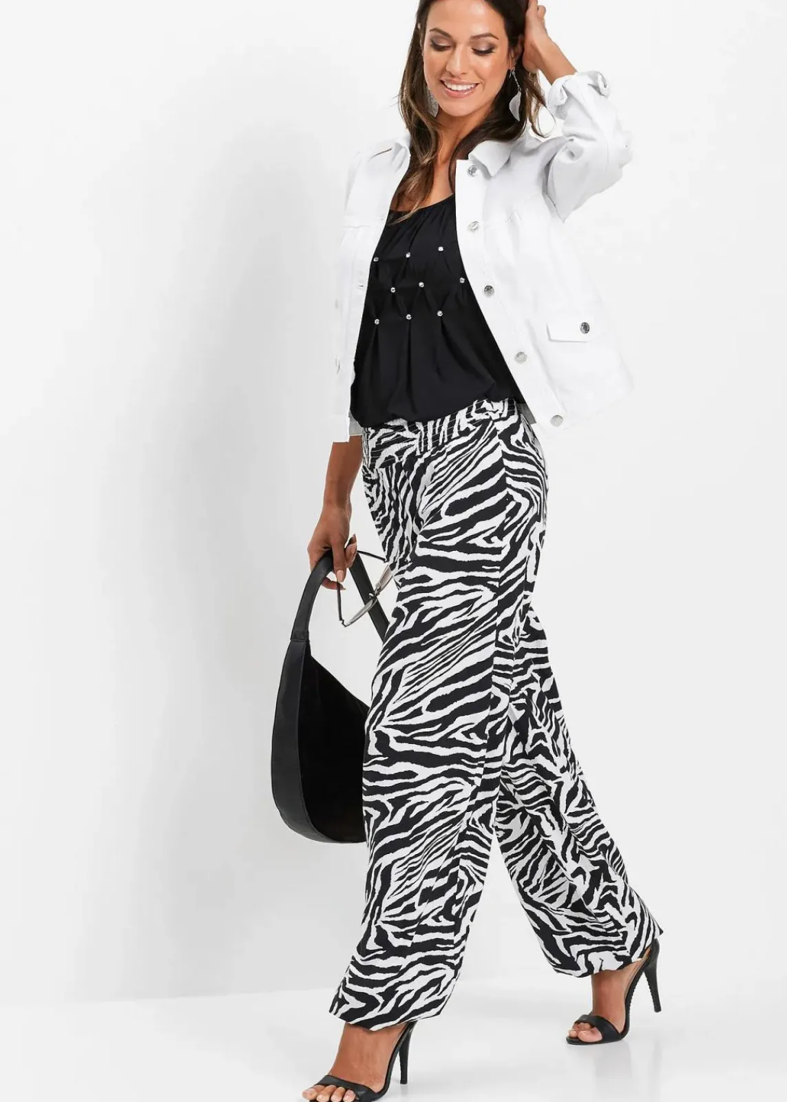 bonprix Nachhaltigere Materialien|Hosen^Palazzo-Hose aus fließender Viskose schwarz zebra bedruckt