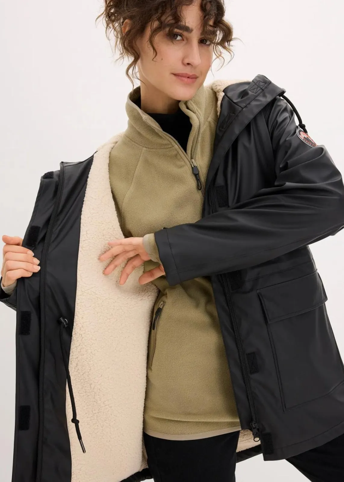 bonprix Bekleidung·Hosen|Jacken & Mäntel^Regenjacke mit Teddyfutter schwarz