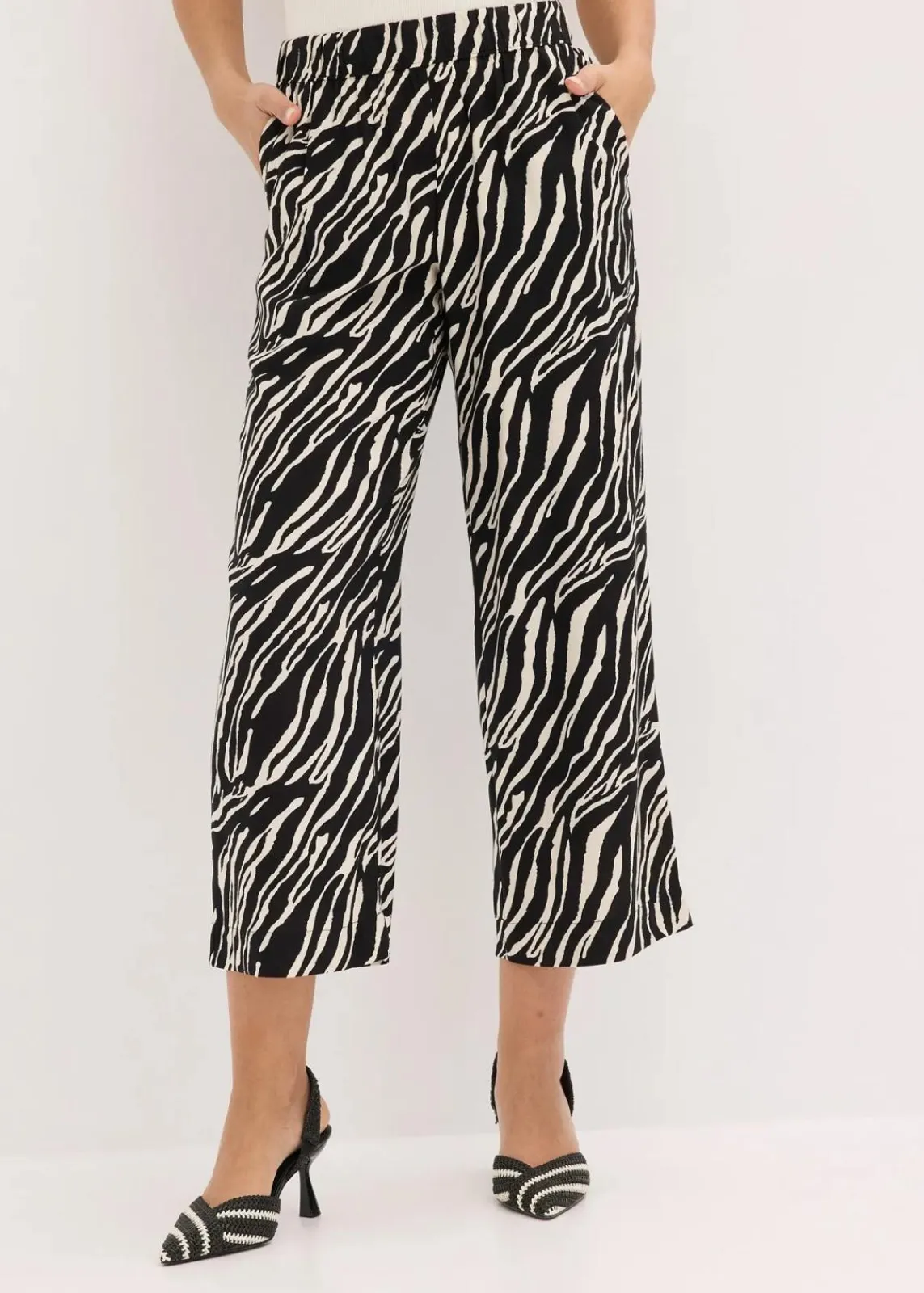 bonprix Nachhaltigere Materialien|Hosen^Schlupfhose schwarz/natur zebra bedruckt