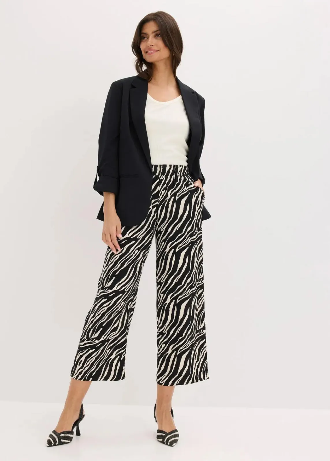 bonprix Nachhaltigere Materialien|Hosen^Schlupfhose schwarz/natur zebra bedruckt