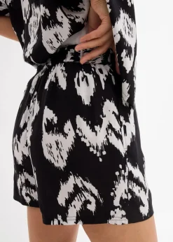 bonprix Nachhaltigere Materialien|Hosen^Schlupf-Shorts aus fließender Viskose schwarz/wollweiß bedruckt