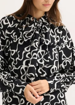 bonprix Blusen & Tuniken|Nachhaltigere Materialien^Schluppenbluse schwarz/weiß bedruckt