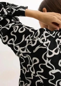 bonprix Blusen & Tuniken|Nachhaltigere Materialien^Schluppenbluse schwarz/weiß bedruckt