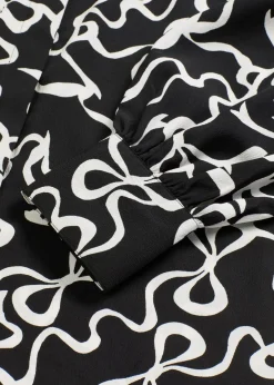bonprix Blusen & Tuniken|Nachhaltigere Materialien^Schluppenbluse schwarz/weiß bedruckt
