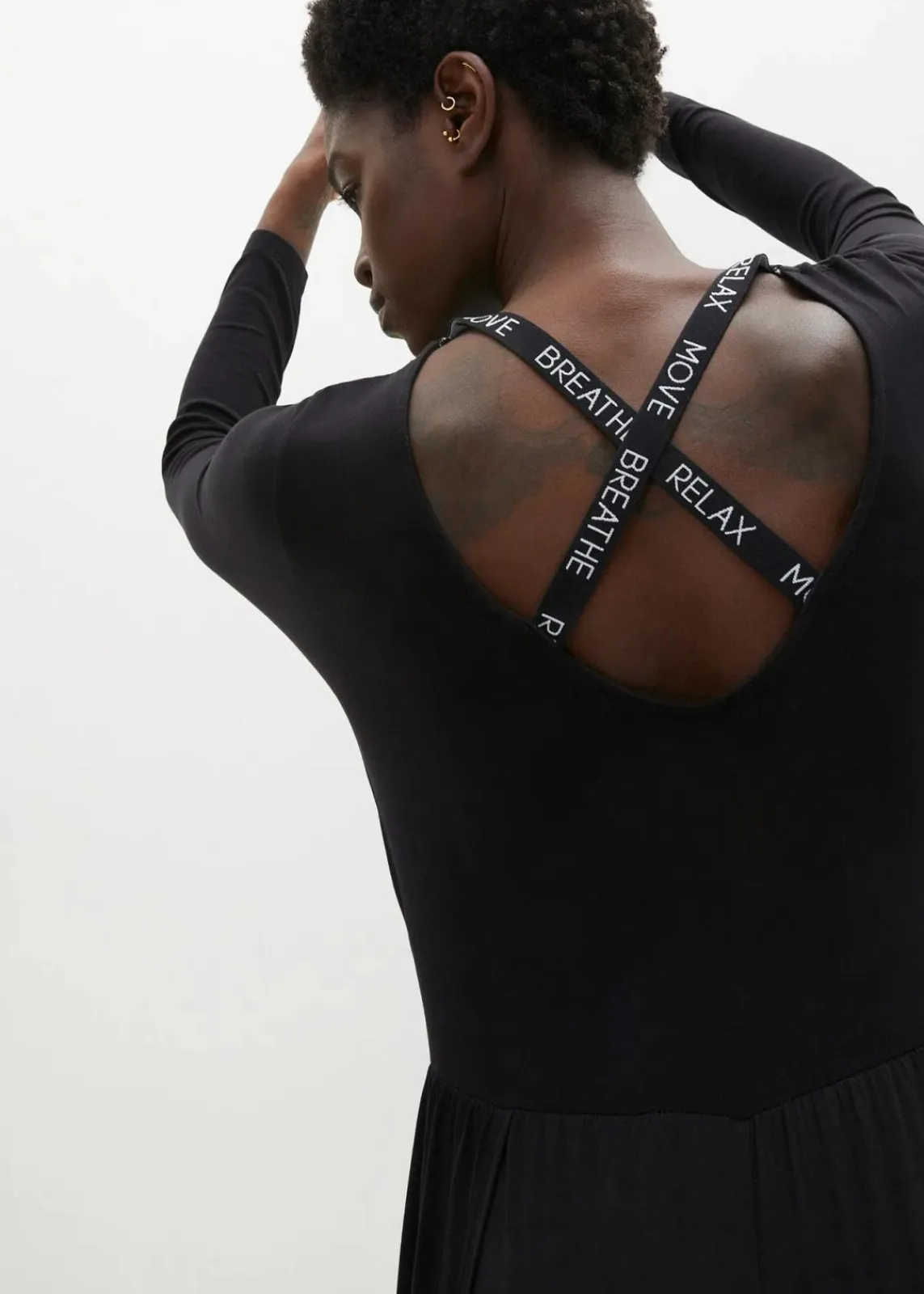 bonprix Bekleidung·Homewear|Jumpsuits^Sport-Jumpsuit aus fließender Viskose schwarz