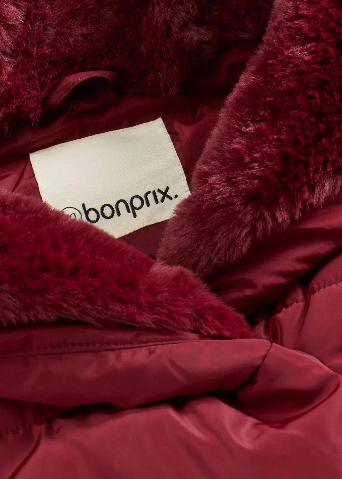 bonprix Jacken & Mäntel|Nachhaltigere Materialien^Steppjacke mit Fellimitatbesatz rubinrot