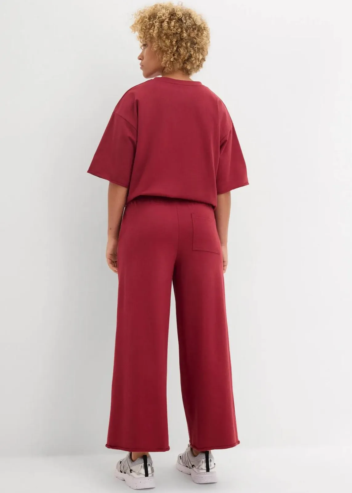 bonprix Hosen|Sweat^Sweathose aus Bio-Baumwolle, 7/8 Länge pflaumenrot
