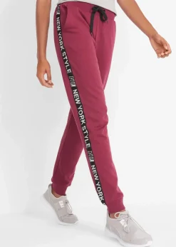 bonprix Hosen|Sweat^Sweathose mit Bündchen und Statement-Druck rhododendronrot bedruckt