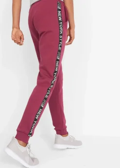 bonprix Hosen|Sweat^Sweathose mit Bündchen und Statement-Druck rhododendronrot bedruckt