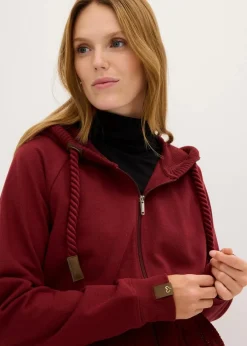 bonprix Sweat|Nachhaltigere Materialien^Sweatjacke mit Strickkapuze und Tasche rubinrot