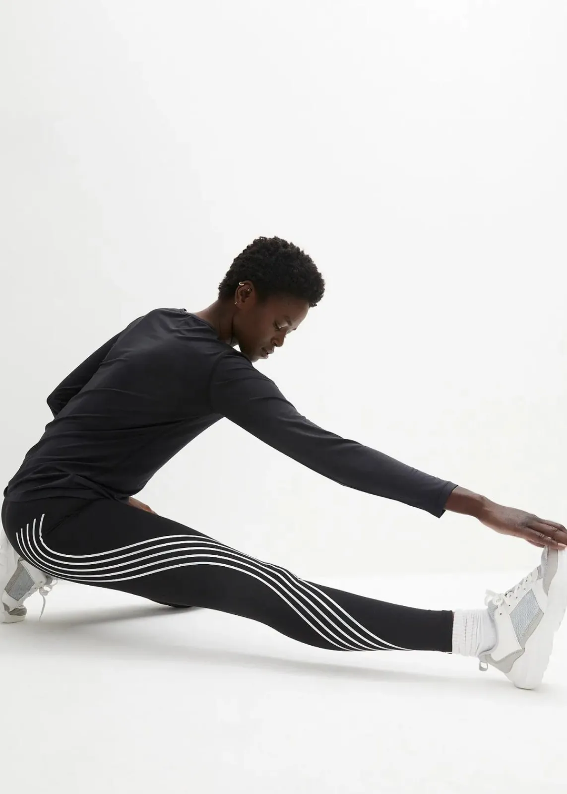 bonprix Bekleidung·Sweat|Bekleidung·Kleider^Thermo-Leggings mit reflektierenden Details, knöchelfrei schwarz