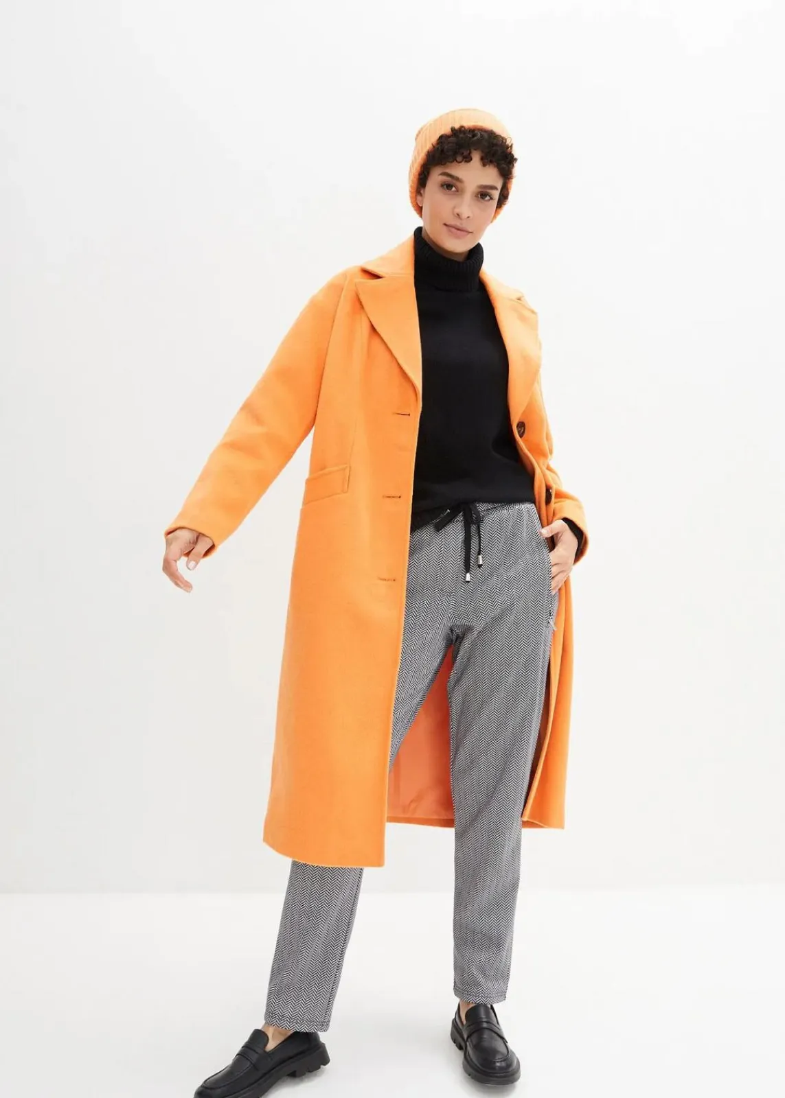 bonprix Hosen|Thermobekleidung^Thermo-Schlupfhose mit Bequembund wollweiß/schwarz graphisch bedruckt