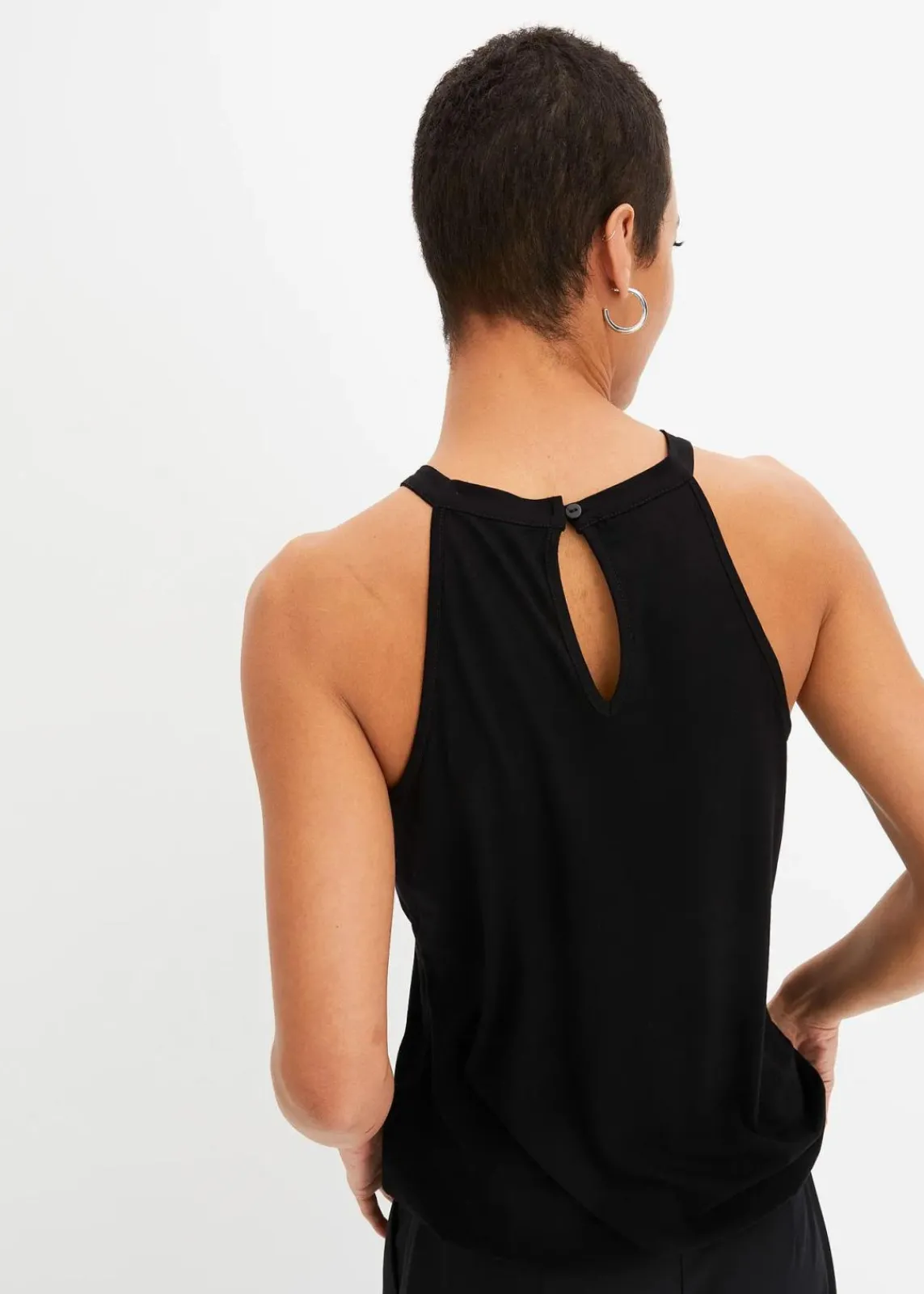 bonprix Shirts & Tops|Nachhaltigere Materialien^Top aus fließendem Viskose-Mix schwarz bedruckt