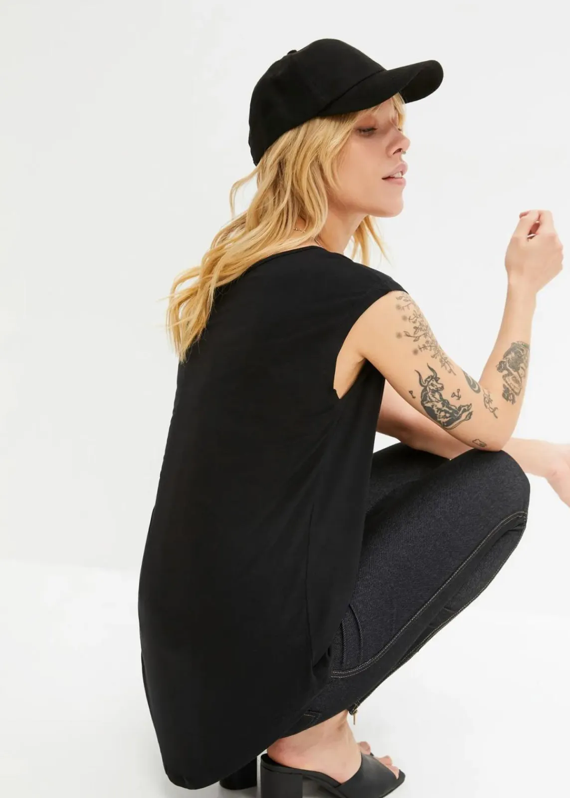 bonprix Shirts & Tops|Nachhaltigere Materialien^Vokuhila-Shirt aus fließendem Viskosemix schwarz